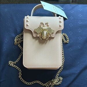 Elegant Cream and Gold Mini Bag with Flap Closure
